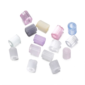 Macro view of 2-3mm macaron tube beads with vertical texture for DIY jewelry making