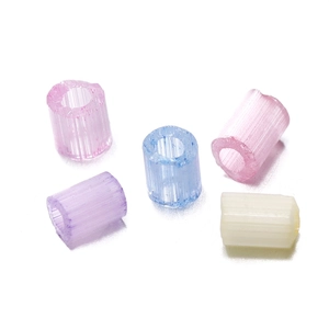 Detail of 2-3mm macaron tube beads with vertical ribbed texture for DIY jewelry making