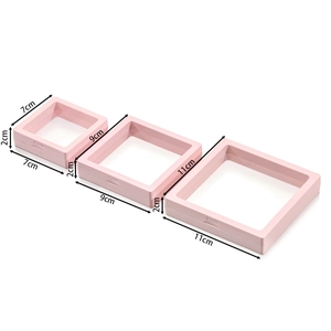 Three sizes of pink square PE film jewelry boxes with push-to-open frames and dimensions