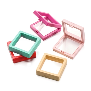 Macro detail of square PE film jewelry display boxes in five vibrant matte colors