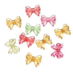 Macro shot of colorful translucent acrylic bow beads for DIY craft and jewelry making