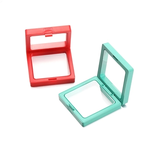 Macro detail of red and mint green PE film suspension display cases with PUSH button