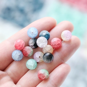 Macro shot of 10mm frosted ice-crack glass beads for DIY necklaces and crafts