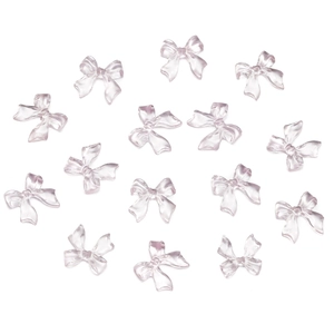 Macro view of light purple translucent resin bow accessories for DIY nail art and crafts