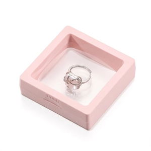 Pink gemstone ring with silver band in a matching jewelry 3D floating display box