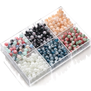 Detailed top view of 6-grid acrylic storage box with multi-colored frosted crackle beads