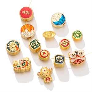 Detail of traditional Chinese lucky charms with gold enamel finish for DIY jewelry
