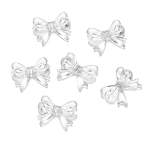 Detail view of 6 transparent acrylic bow beads with fine silk-like texture for DIY jewelry