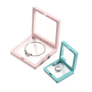 Pink and green PE film jewelry display boxes with suspension storage for rings and bracelets