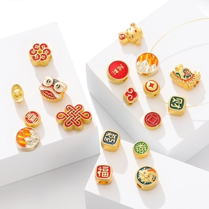 Detailed view of alloy gold-plated lucky charms beads with traditional Chinese characters