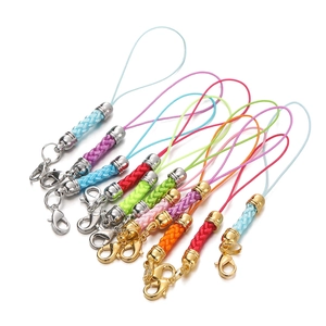 Macro shot of colorful woven lobster clasp lanyards for DIY charms and jewelry crafts