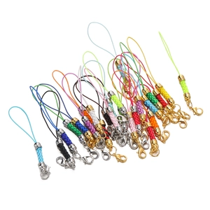 Close-up of colorful braided lanyard cords with metallic lobster clasps for DIY jewelry