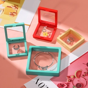 Detail of multi-colored PE film jewelry suspension boxes with push-button opening system
