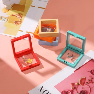 Macro shot of colorful PE film suspension jewelry boxes for necklaces and rings