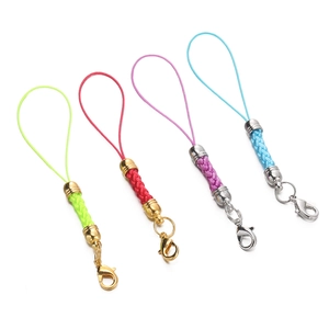 Macro view of colorful braided lanyards with lobster clasps for DIY phone accessories