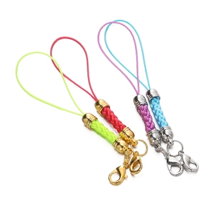 Detail of colorful braided lanyards with metal lobster clasps for DIY phone accessories