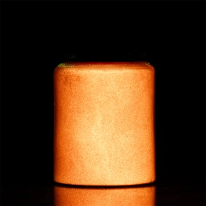 Detailed close-up of 20g orange luminous glow powder container with metallic matte texture