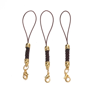 Three brown braided lanyards with golden lobster clasps and metal spherical accents