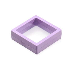 Close-up of lilac PE film suspension jewelry box showing the push-to-open mechanism