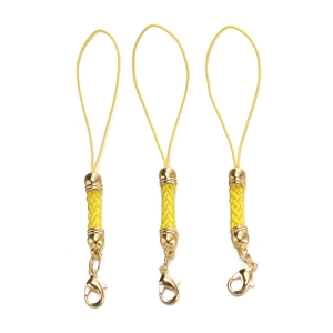 Detailed view of yellow braided mobile phone lanyards with golden lobster clasps