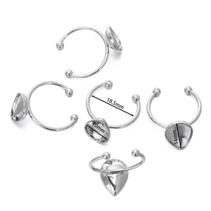 Detailed view of silver stainless steel horseshoe ring with teardrop DIY setting base