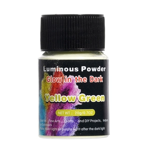 Close-up of a 20g bottle of yellow-green luminous powder for DIY art and crafts