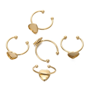 Detailed view of five adjustable 18k gold plated stainless steel heart ring base settings
