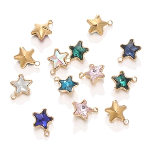 Detailed view of colorful star charms with 18k gold plating and vibrant rhinestones