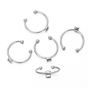 Close-up of 5 pieces of silver stainless steel DIY ring settings with rectangular base