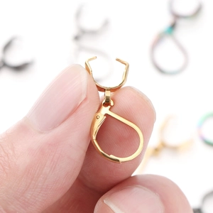 Macro shot of gold-plated stainless steel lever back ear hooks with pinch bail connectors