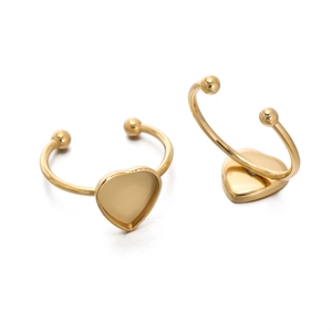 Macro detail of 18k gold plated heart-shaped adjustable ring bases for DIY jewelry