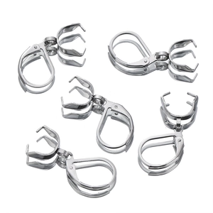 Macro detail of stainless steel earring hooks with four-prong settings for DIY jewelry
