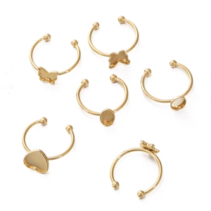 Set of 6 gold plated stainless steel adjustable ring bases in heart and star shapes