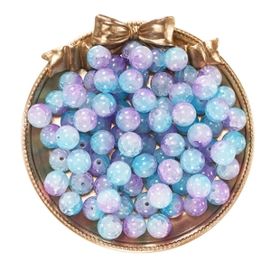 10mm blue purple gradient cracked glass beads for DIY necklaces displayed on a gold tray