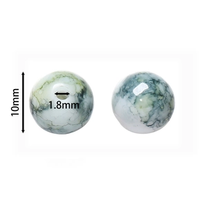 Détail macro d'une perle de verre marbrée de 10mm avec trou de 1,8mm pour bijoux DIY