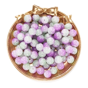 Close-up of 10mm cracked glass beads in purple and green for DIY jewelry making