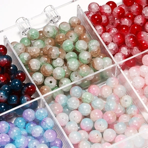 Close-up of 10mm colorful glass beads with ice crack texture in clear organizer