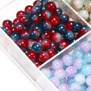 Macro detail of 10mm cracked glass beads in dual-tone colors for DIY jewelry making