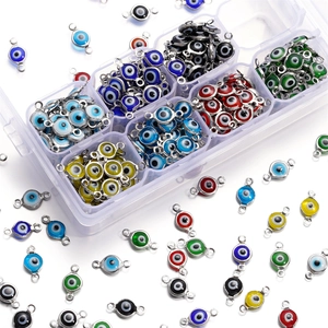 Macro detail of assorted colorful evil eye connectors and organizer for DIY jewelry