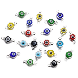 Detailed macro view of colorful evil eye connectors for DIY jewelry making