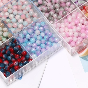 Macro view of 10mm cracked glass beads in various colors for DIY jewelry making