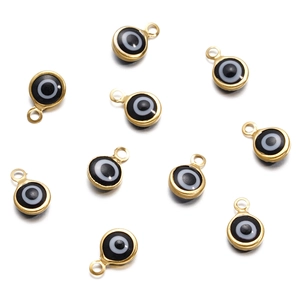 Macro view of stainless steel evil eye connector pendants for DIY jewelry making