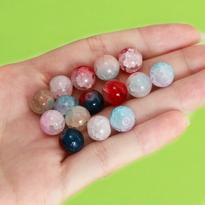 Close-up of 10mm dual-tone cracked glass beads for DIY jewelry and phone accessories