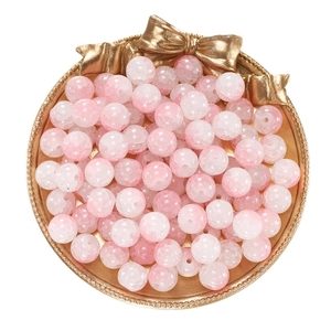10mm pink cracked glass beads for DIY jewelry making in a decorative gold tray