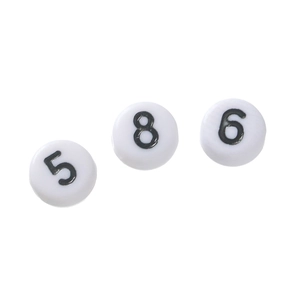 Macro detail of white acrylic round beads with clear black printed numbers 5, 8, and 6