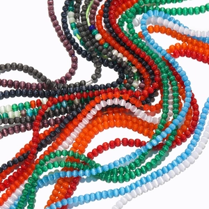 Macro shot of 2mm colorful cat-eye glass beads for DIY jewelry and phone chains