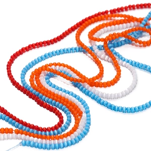 Close-up of 2mm cat-eye glass seed beads in red, orange, blue, and white for DIY jewelry