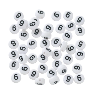 Detailed view of round white acrylic beads with black numbers 9 and 6 for DIY jewelry