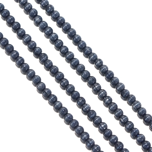 Macro shot of 2mm dark blue cat-eye beads strands for DIY jewelry and phone chain making