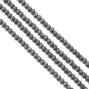 Detailed view of 2mm grey cat-eye glass beads for DIY jewelry and bracelet making